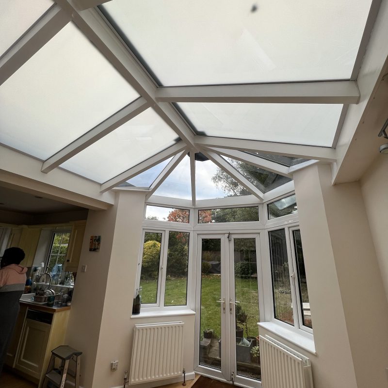 Conservatory skylight with retrofitted switchable film