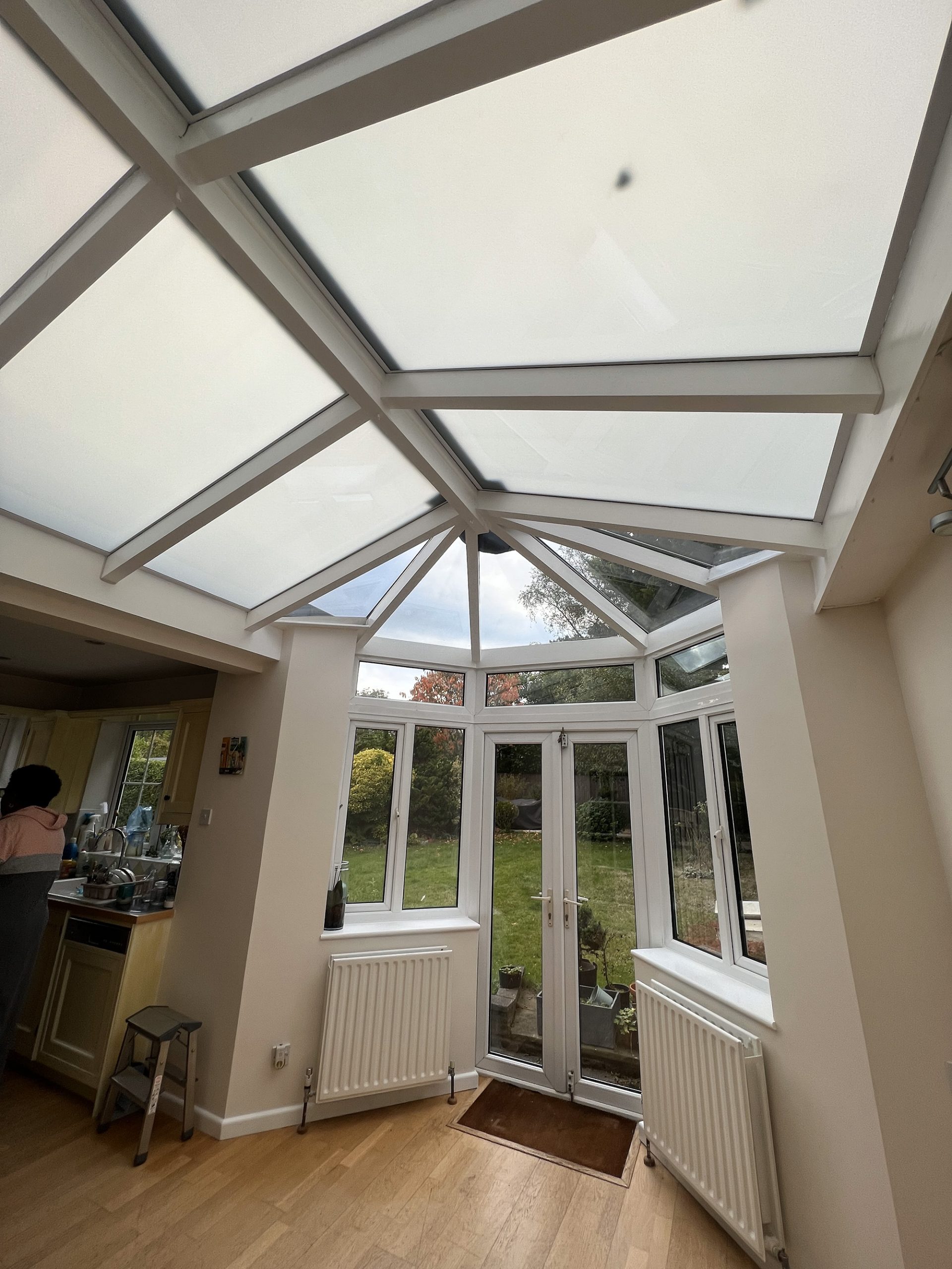 Conservatory skylight with retrofitted switchable film