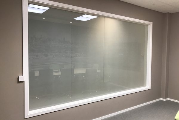 Privacy window with switchable film