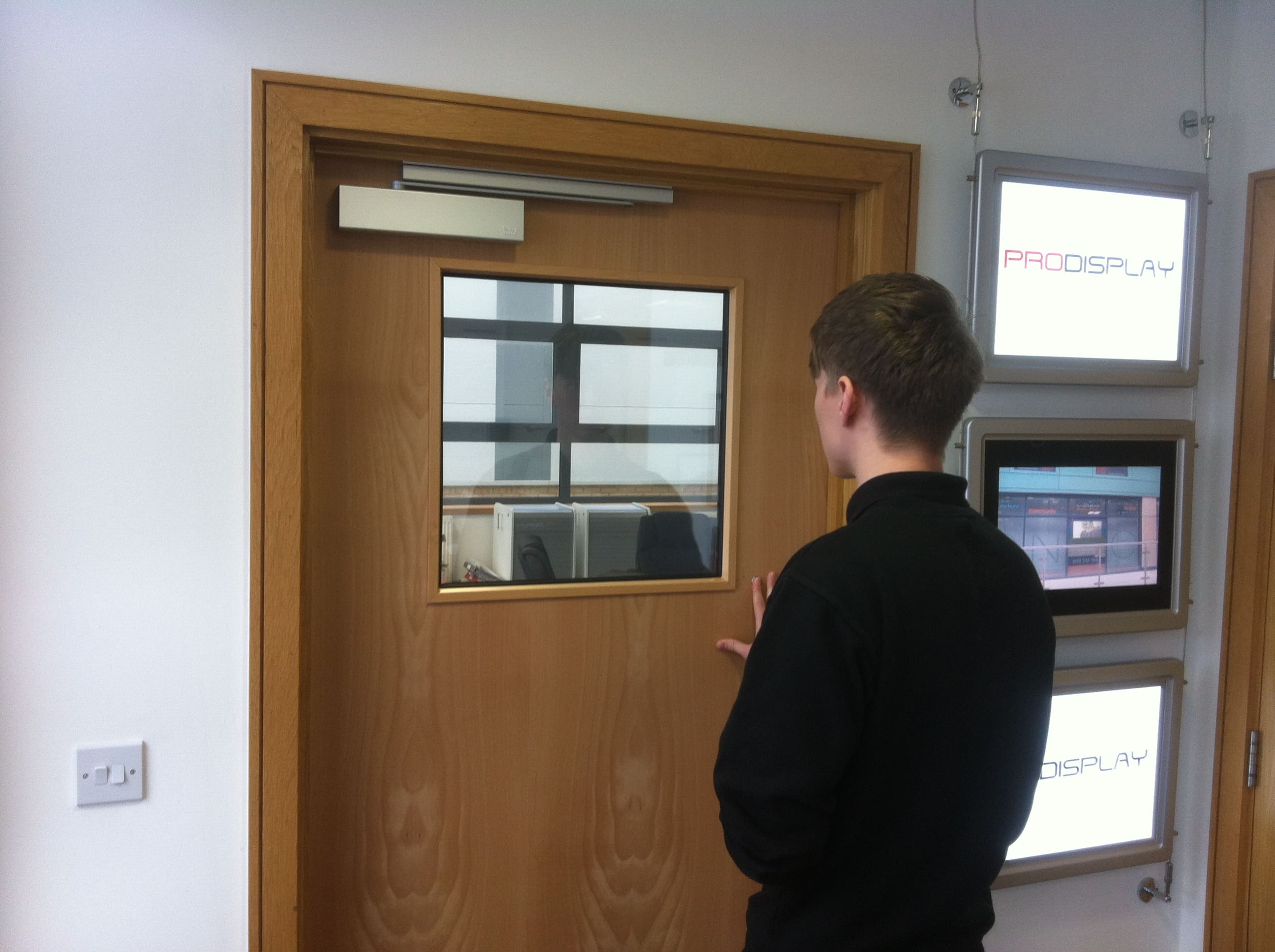 Square Switchable Smart Glass Door Vision Panel switched to on in office door