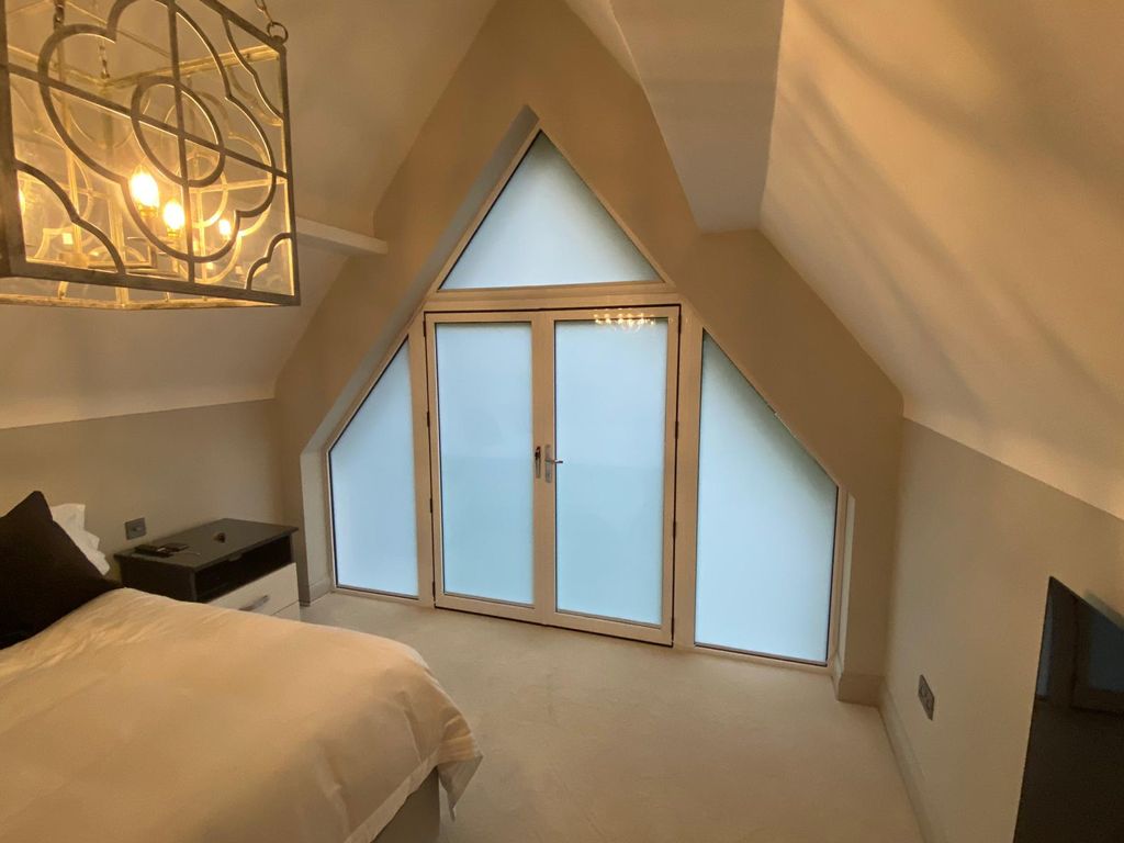 Master Bedroom Stuns with Switchable Film