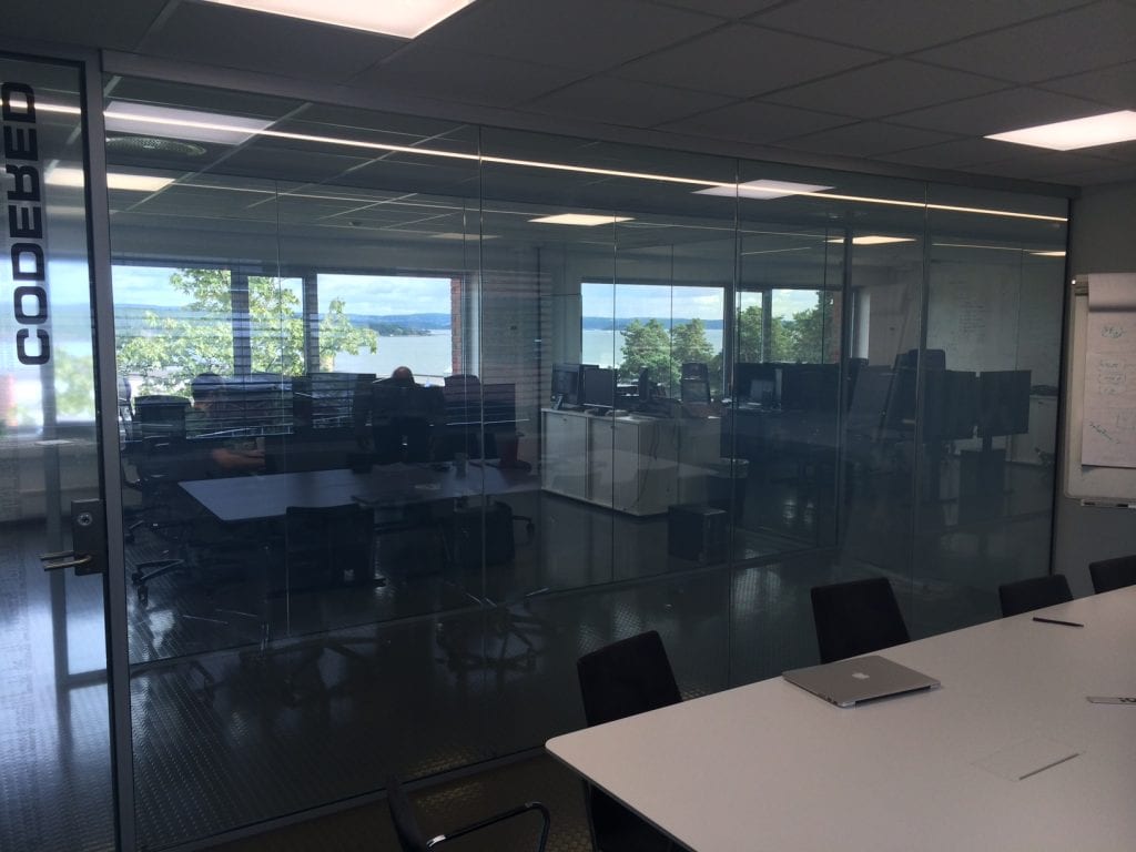 Switchable smart glass office partition - switched on clear